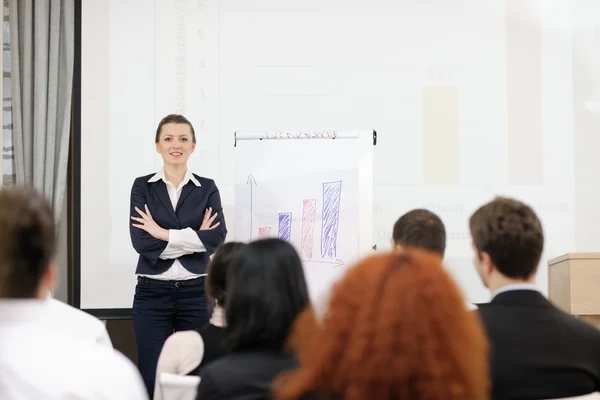 Business woman giving presentation — Stok fotoğraf