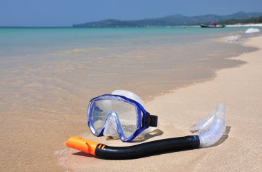 Snorkeling set on Bangtao beach of Phuket island clipart