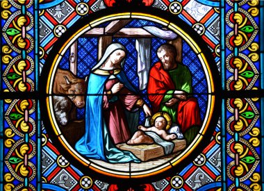 Nativity Scene. Stained glass window in the Basel Cathedral. clipart