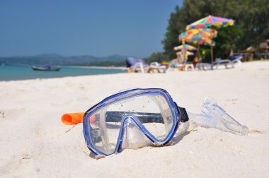 Snorkeling set on Bangtao beach of Phuket island clipart