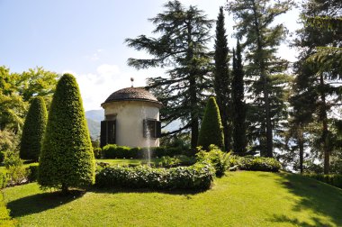 Park of Villa Serbelloni in Bellagio at the famous Italian lake clipart