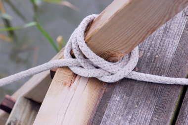 Rope with tie isolated over white background clipart