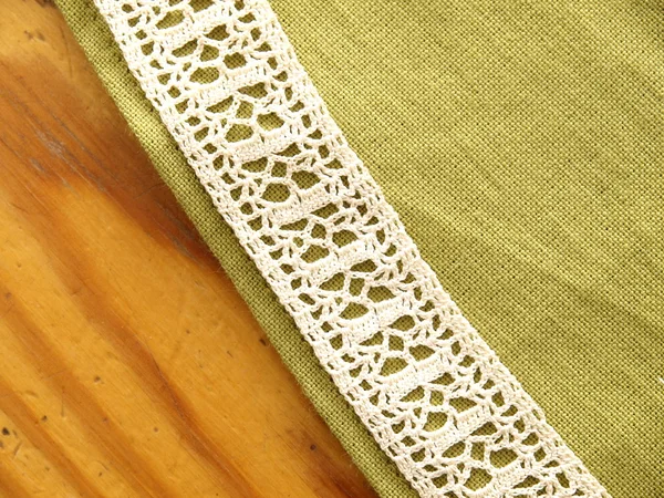 Detalj av en linne servett med spets — Stockfoto