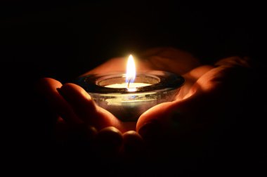 Candle in the hand clipart