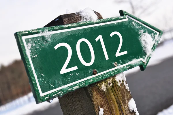 2012 road sign covered with snow — Stock Photo, Image