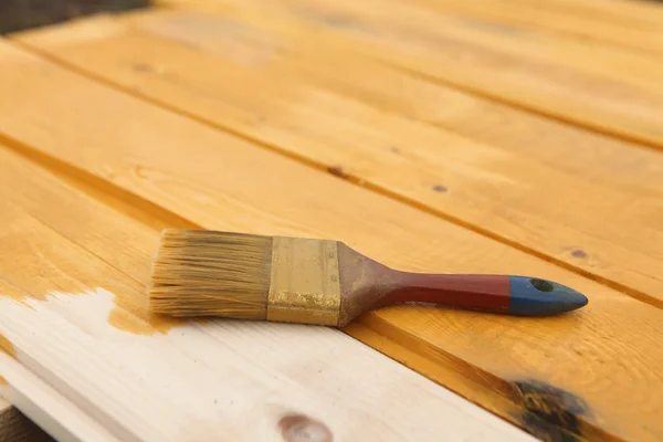 Staining wood surfaces. before and after — Stock Photo, Image