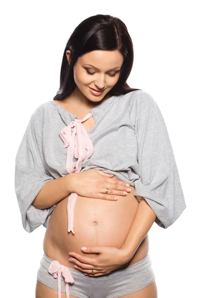 Mujer embarazada. Imagen de stock