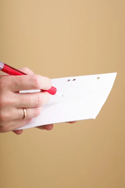 Notebook e donne penna rossa — Foto Stock