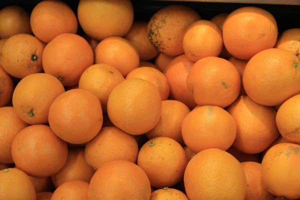 Pilha de laranjas frescas — Fotografia de Stock