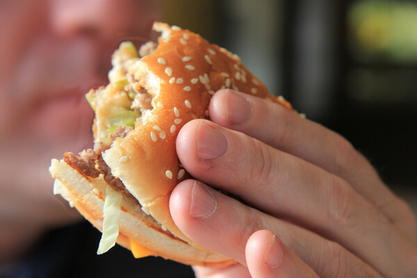 Man enjoying his hamburger