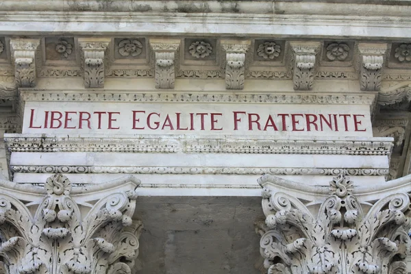 Liberté, égalité, fraternité inscription in townhall Avignon — Stok fotoğraf