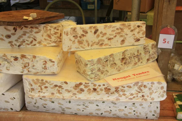 Big pieces of nougat on a French market — Stock Photo, Image