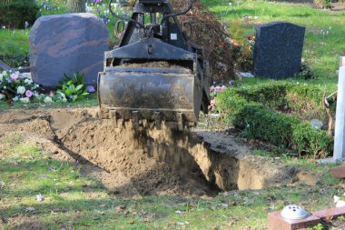 Gravedigger at work clipart