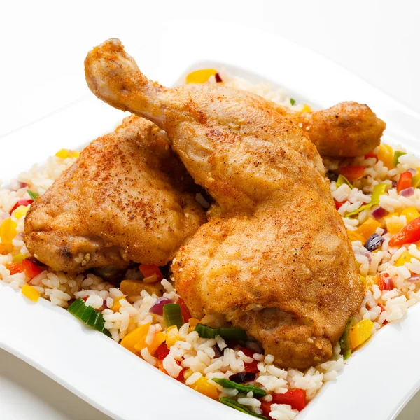 stock image Roasted chicken legs, rice and vegetables