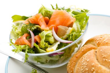 Salad - smoked salmon, brad and vegetables clipart