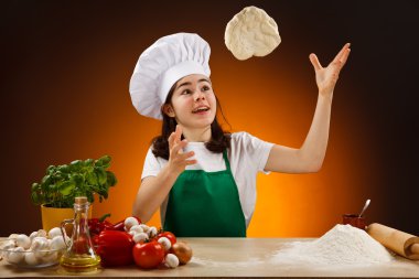 Girl making pizza dough clipart