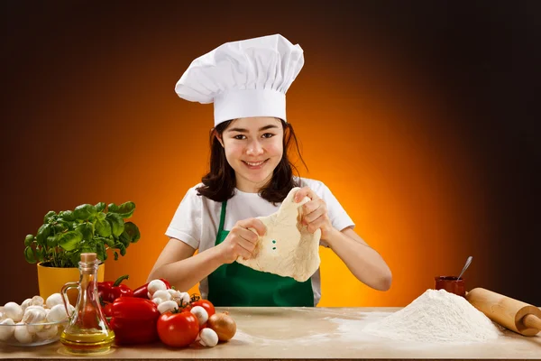 Girl making pizza dough — Stock Photo, Image
