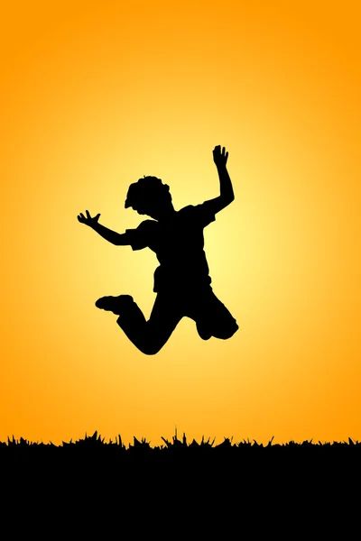 Silhouette of jumping boy — Stock Photo, Image