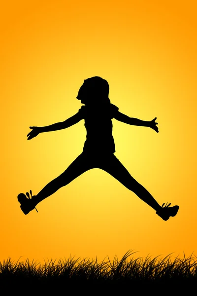 Kız atlama siluet — Stok fotoğraf