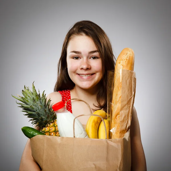 Girl holding shopping bag — Stock Photo, Image