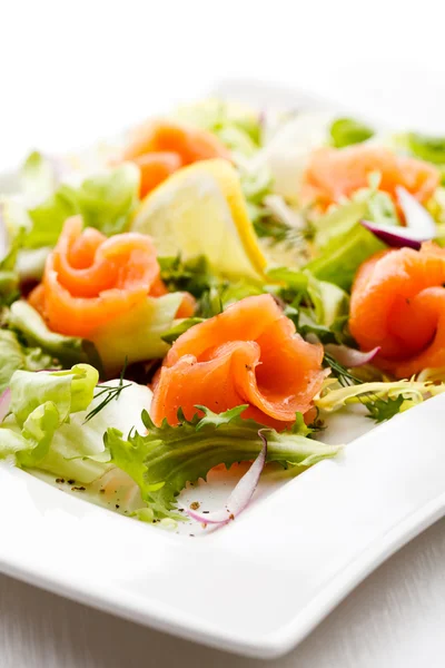 Salad - smoked salmon, brad and vegetables — Stock Photo, Image