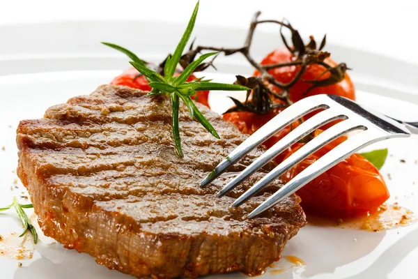 Roston sült steak és a sült toamtoes — Stock Fotó