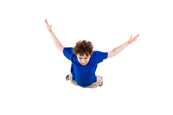 Junge springt, läuft isoliert auf weißem Hintergrund — Stockfoto