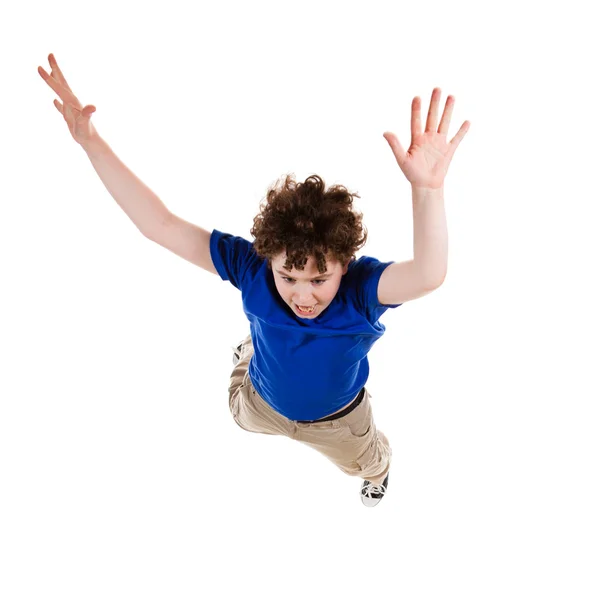 Мальчик прыгает, бегая изолированные на белом фоне — стоковое фото