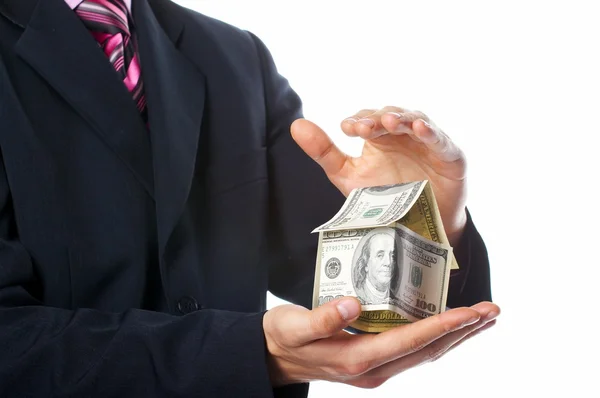 Het huis geld in menselijke handen — Stockfoto