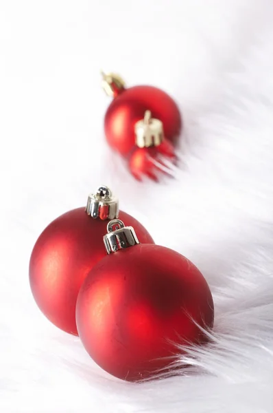 Red christmas balls with snow — Stock Photo, Image