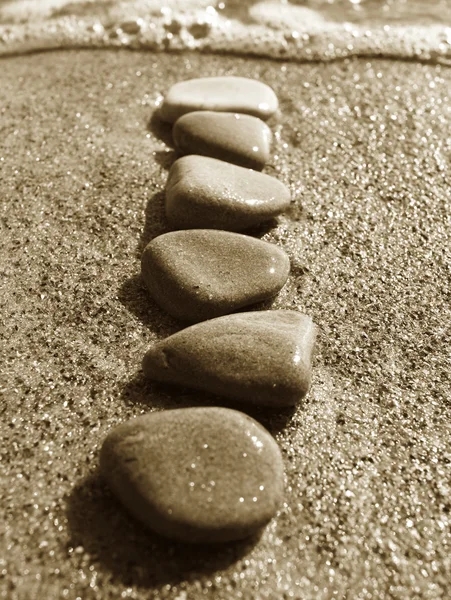 stock image Stones on sand at the sea, a pebble