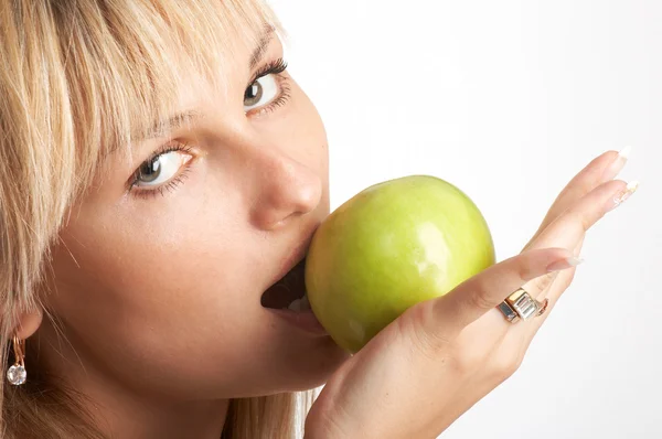 The girl with an apple — Stock Photo, Image