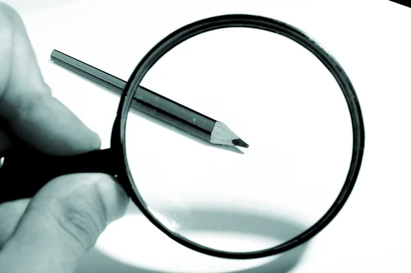 Magnifying Glass, pencils — Stock Photo, Image
