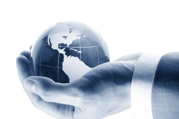 Världen i hand och global internet och företag — Stockfoto