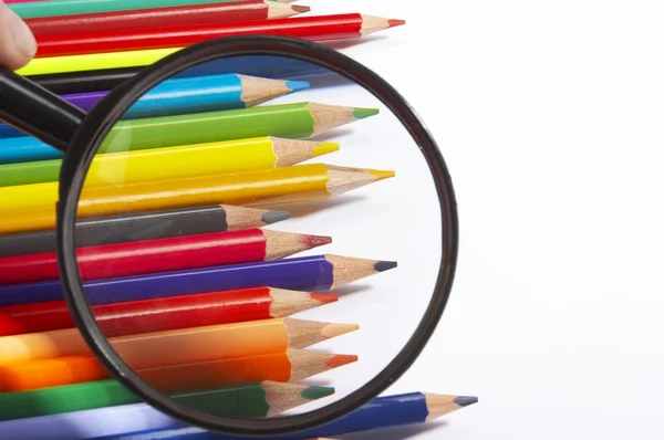 Color pencils, magnifier — Stock Photo, Image