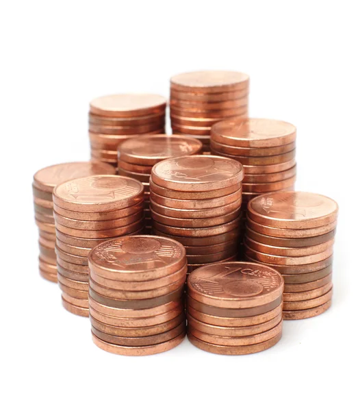Monedas sobre fondo blanco — Foto de Stock