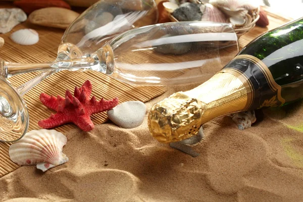 stock image Champagne sparkling on a beach