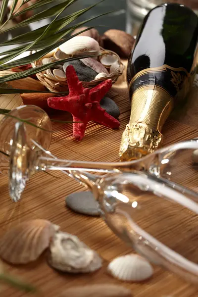 Champagner funkelt am Strand — Stockfoto
