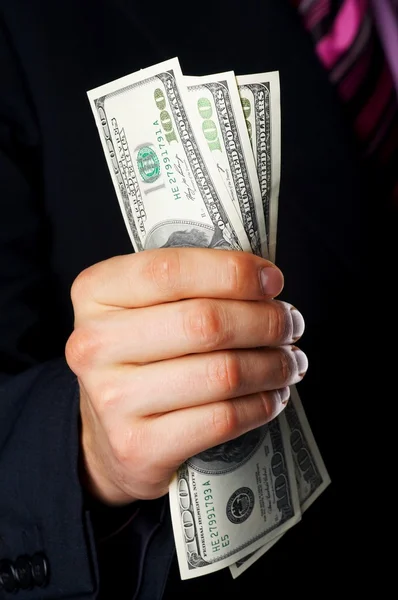Рука, деньги долларов США — стоковое фото