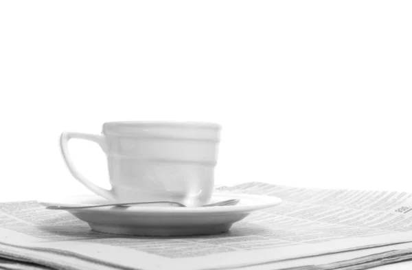 stock image Cup coffee on a morning paper business news