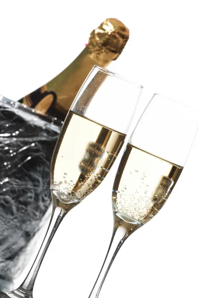 Champagne flutes and ice bucket — Stock Photo, Image
