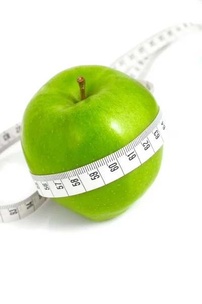 Yeşil elmalar ölçtü taksimetreyi, spor elmalarını — Stok fotoğraf