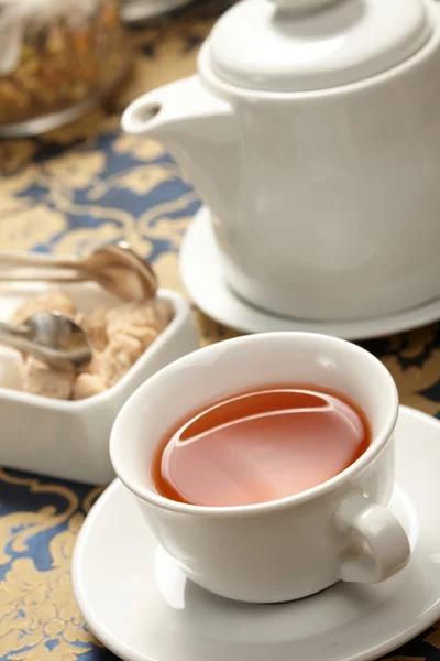 Cup of tea with a teapot — Stock Photo, Image