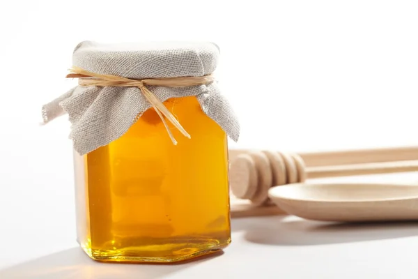 Honey with wood stick — Stock Photo, Image