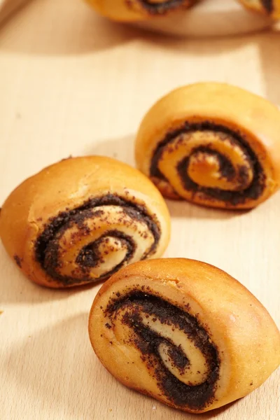 stock image Poppy rolls on the table