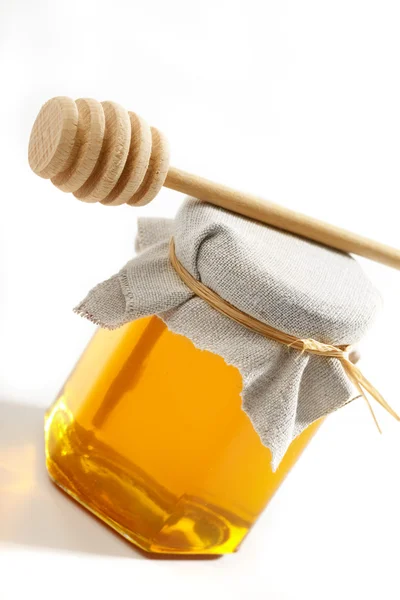 Honig mit Holzstab — Stockfoto