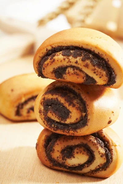 Stock image Poppy rolls on the table