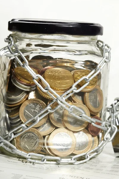 Coins in money jar — Stock Photo, Image