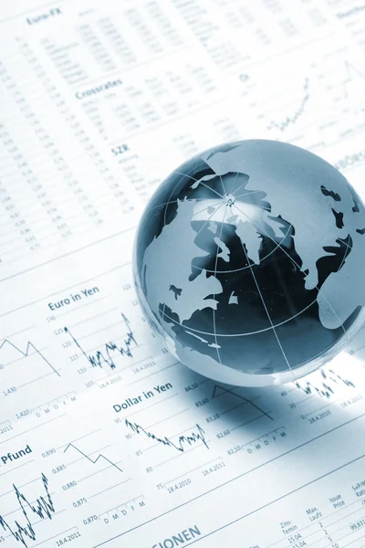 Globe on business documents — Stock Photo, Image