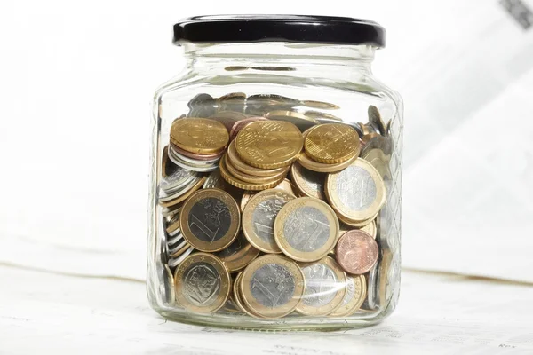 Three glass jars filled with American coins — Stock Photo © Balefire9 ...